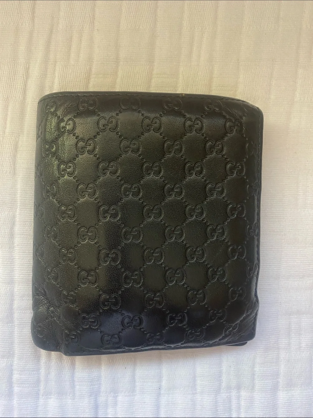 Gucci Dark Brown GG Embossed Leather Bi-Fold Wallet